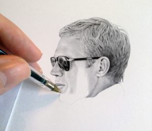man drawing face